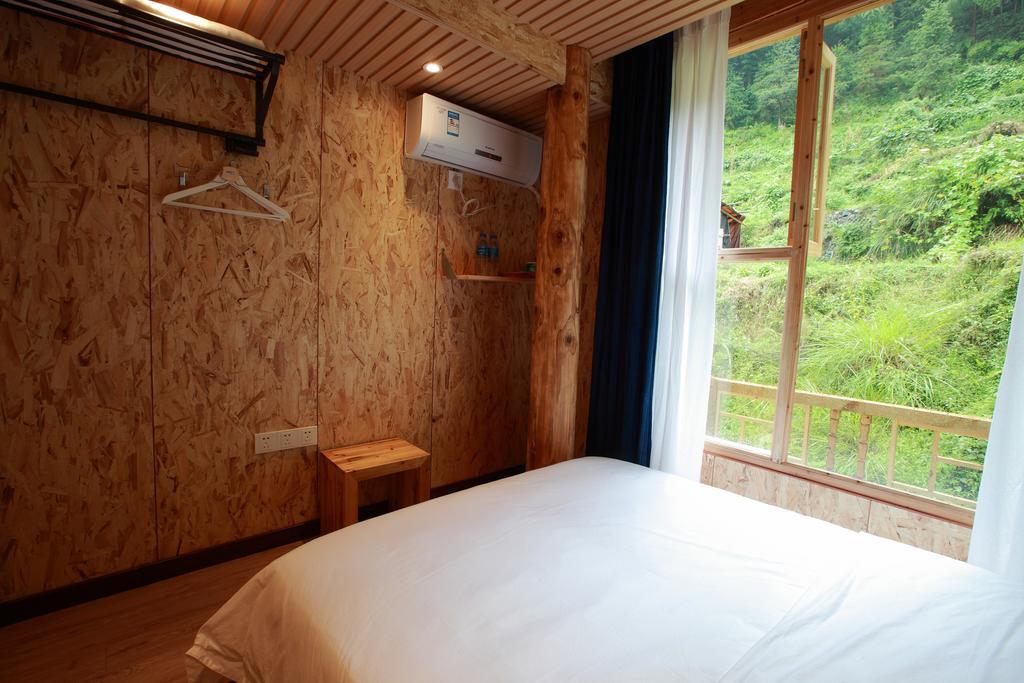 Tong Sang Art Hotel Liping Cameră foto
