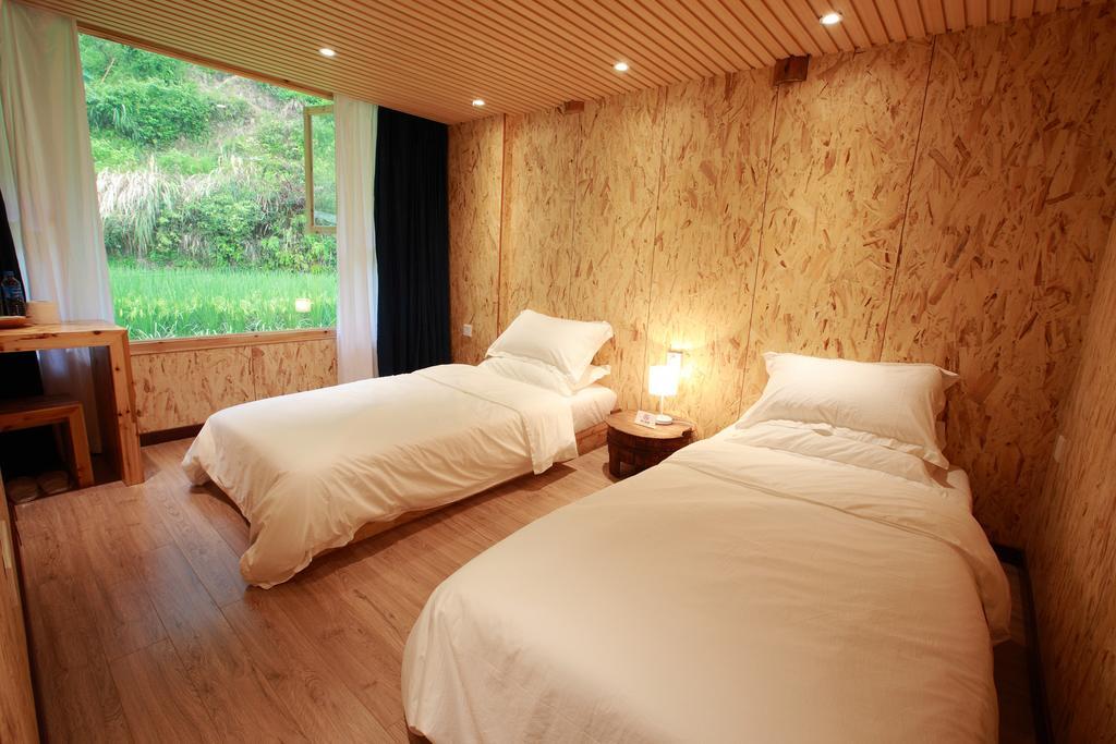 Tong Sang Art Hotel Liping Cameră foto